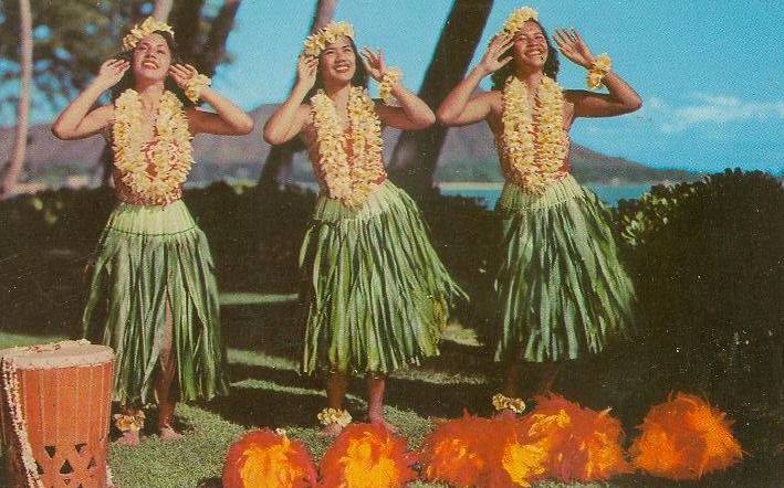 Three hula dancers