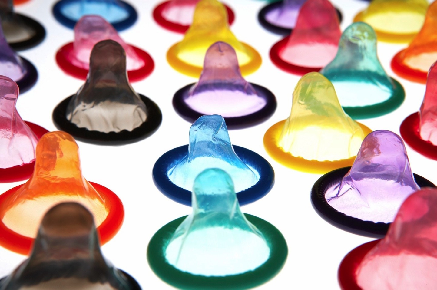 A row of colored condoms
